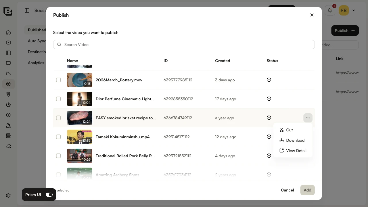 Kebab menu open on a video row showing the Cut option